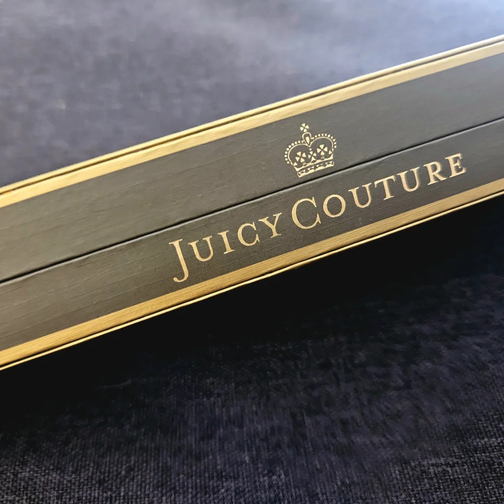 Juicy Couture Silver Bow Charm Bracelet - Picture 6 of 7